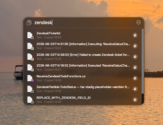 macOS 26 Spotlight with Clipboard History section visible